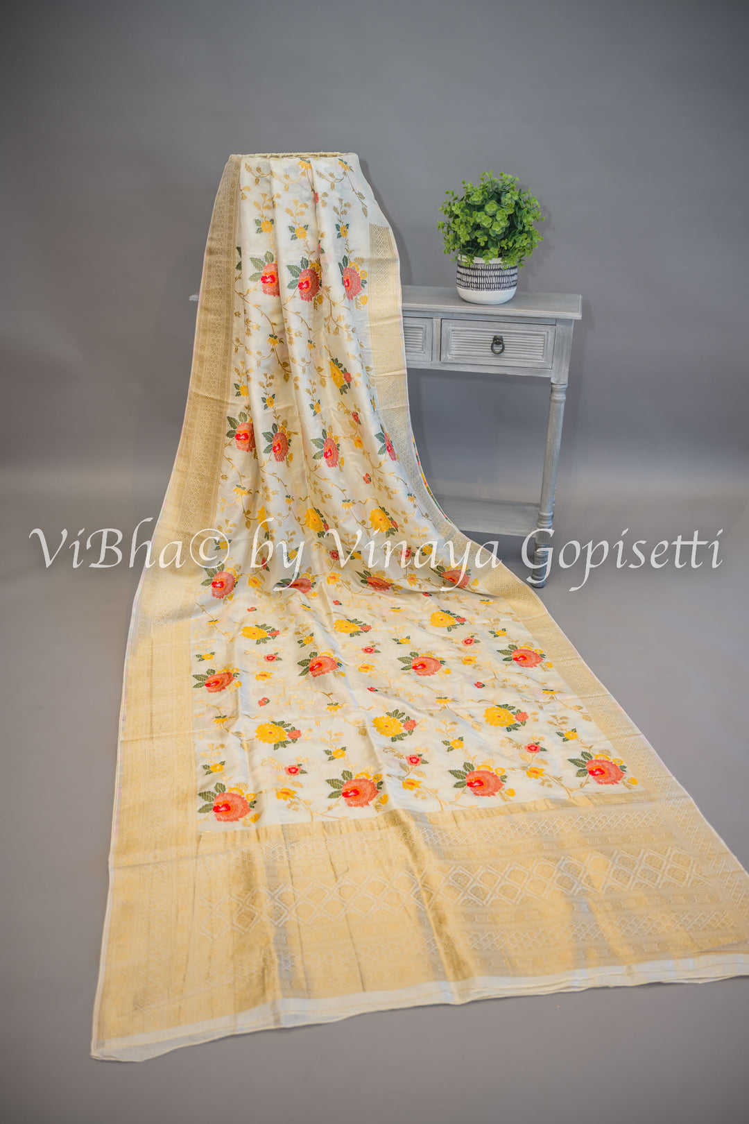 Off White Banarasi Katan Silk Saree And Blouse With Floral Motifs