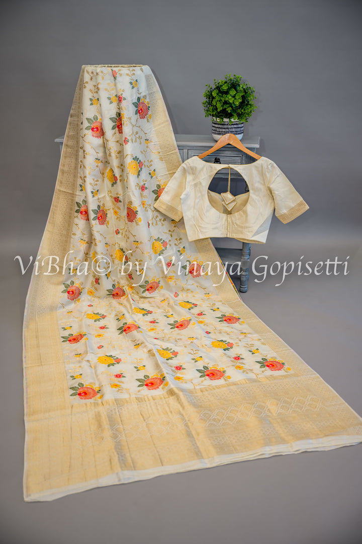 Off White Banarasi Katan Silk Saree And Blouse With Floral Motifs