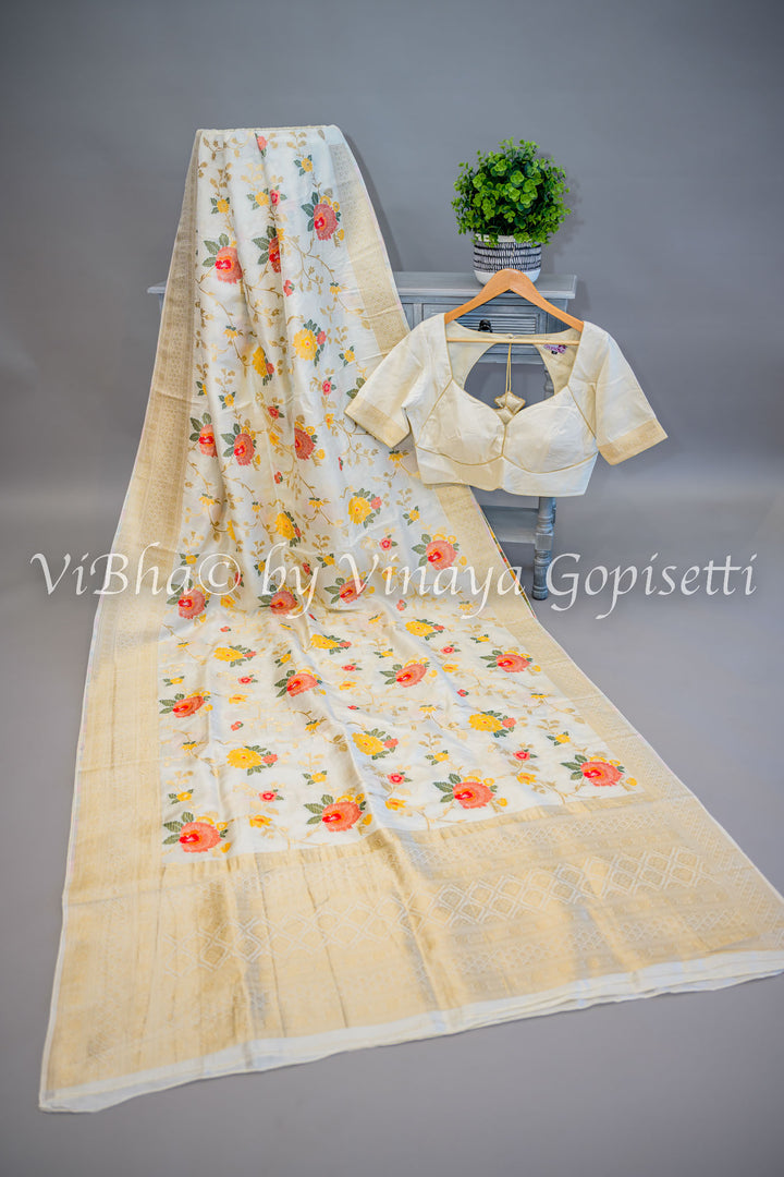 Off White Banarasi Katan Silk Saree And Blouse With Floral Motifs