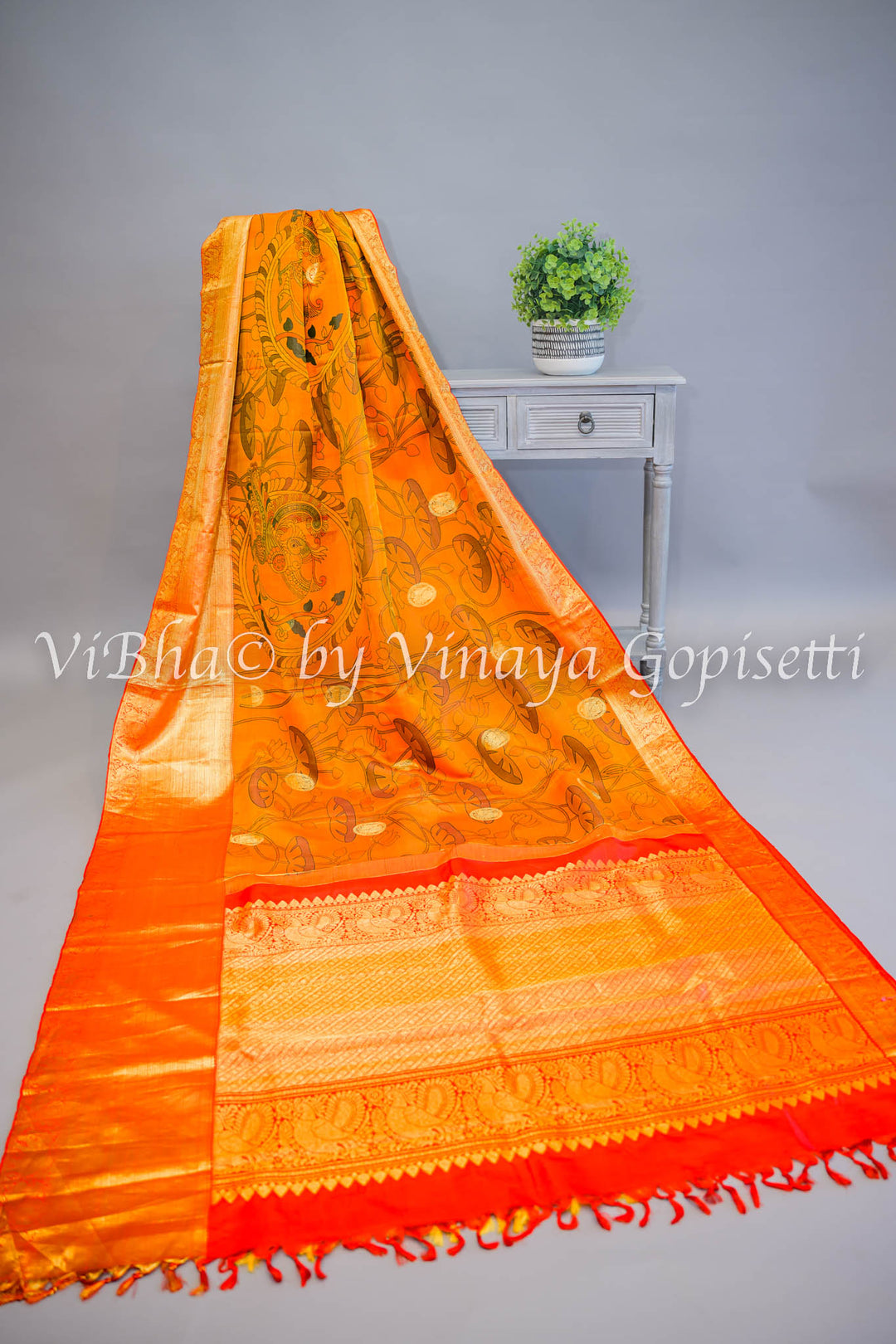 Rust and Red Kanchi Pen Kalamkari Silk Saree And Blouse