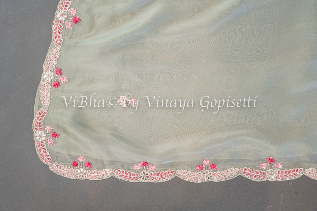 Pastel And Dark Green Soft Organza Embroidered Saree And Blouse