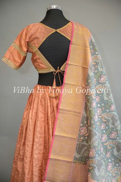 Copper Kanchi Silk Lehenga with Embroidered Borders And Pen Kalamkari Dupatta