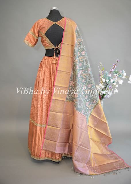 Copper Kanchi Silk Lehenga with Embroidered Borders And Pen Kalamkari Dupatta