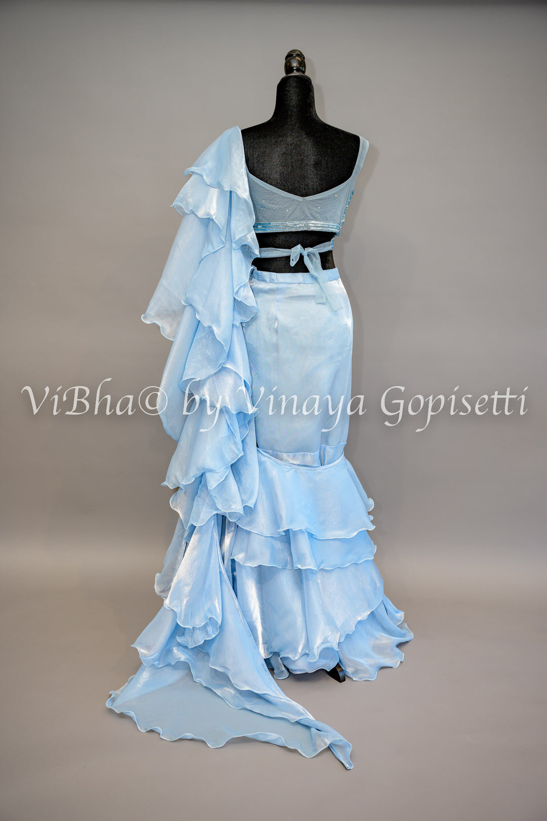 Sky Blue Ruffled Draped Saree And Embroidered Blouse