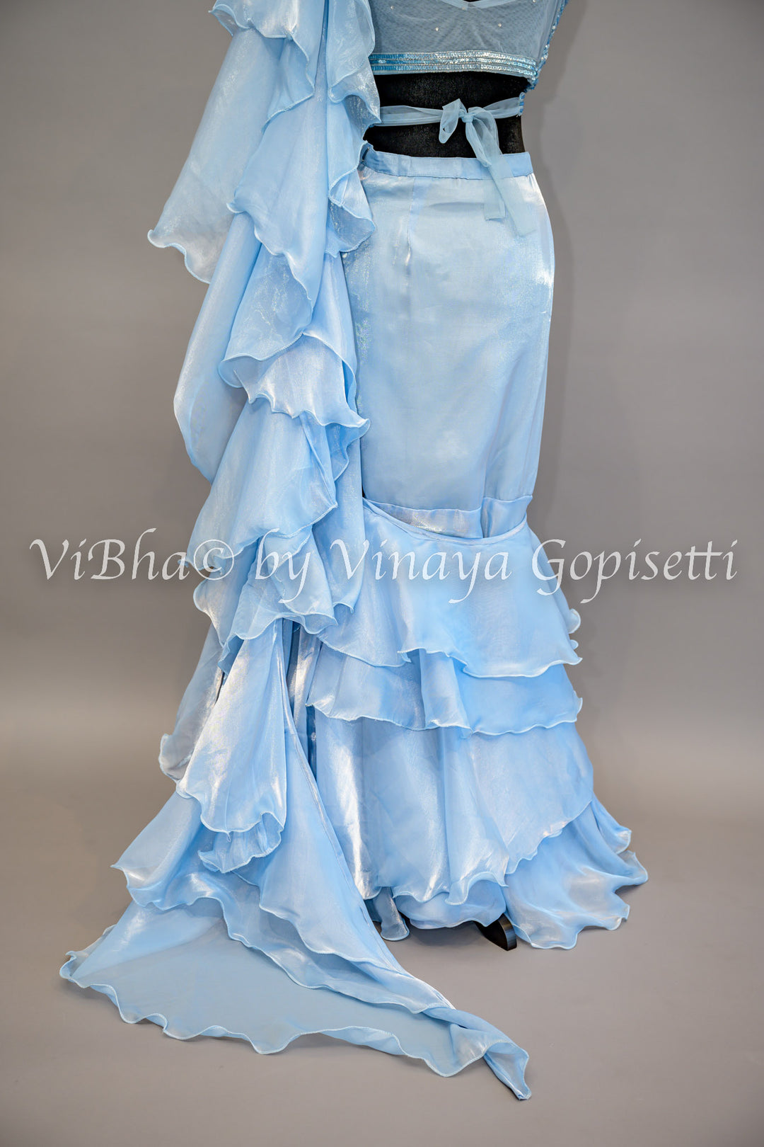 Sky Blue Ruffled Draped Saree And Embroidered Blouse