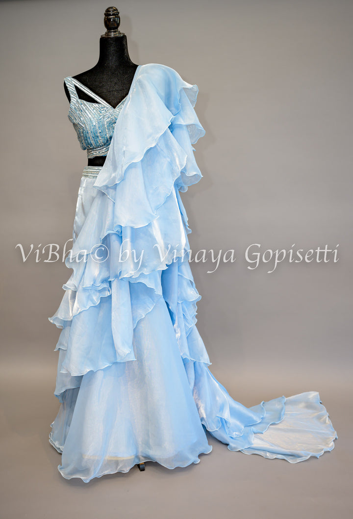 Sky Blue Ruffled Draped Saree And Embroidered Blouse