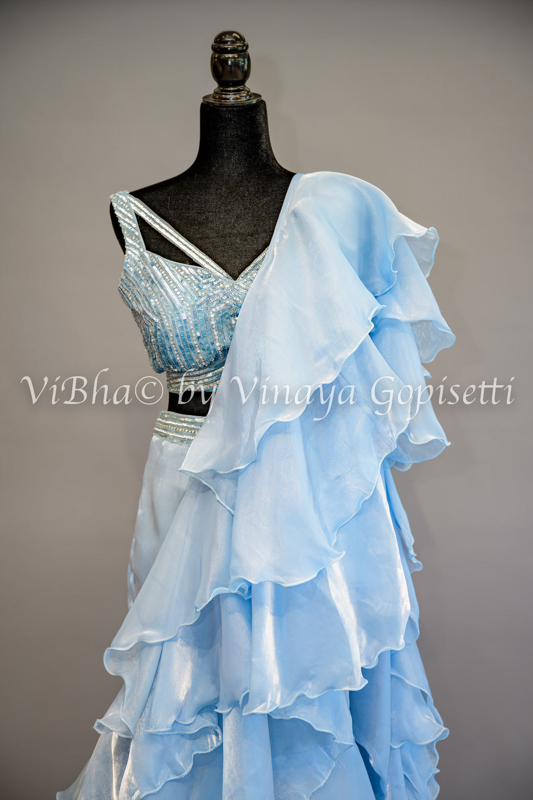 Sky Blue Ruffled Draped Saree And Embroidered Blouse