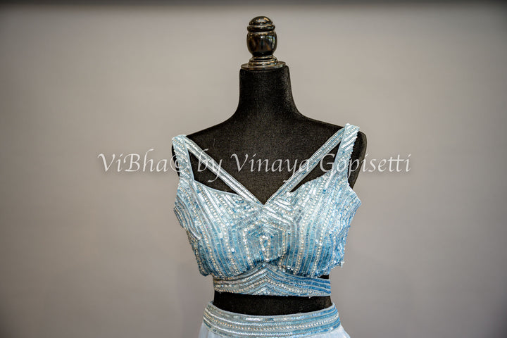 Sky Blue Ruffled Draped Saree And Embroidered Blouse