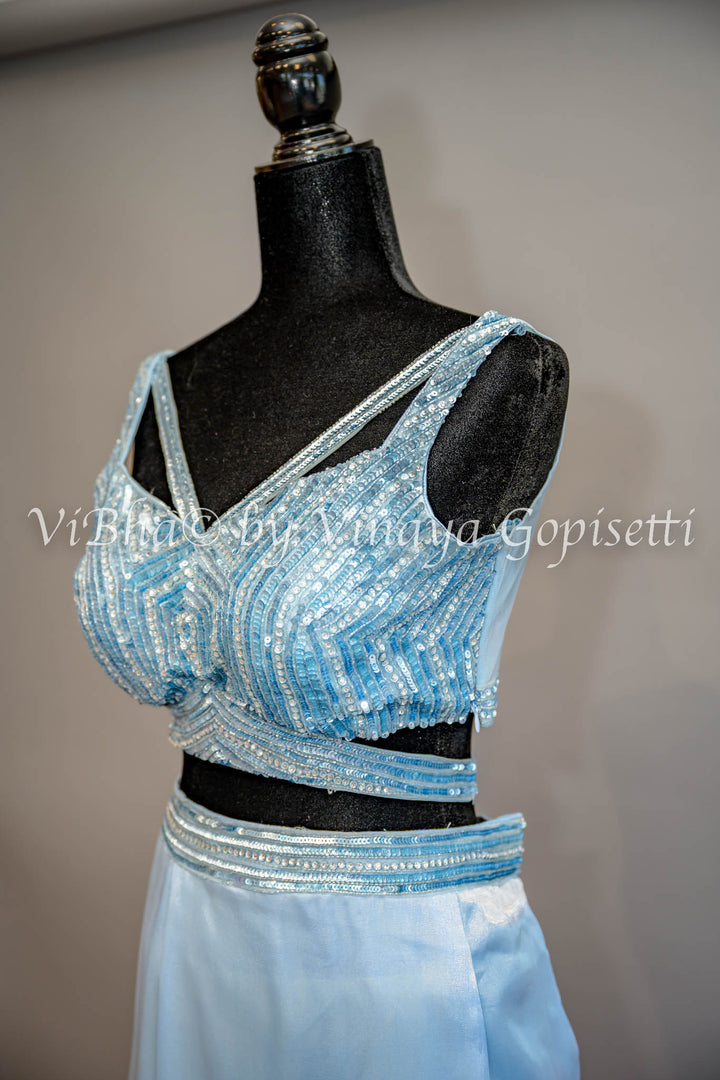 Sky Blue Ruffled Draped Saree And Embroidered Blouse