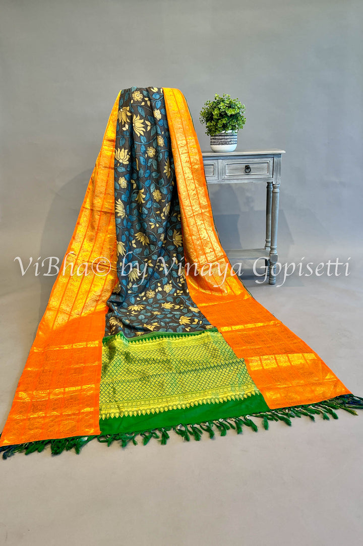 Indigo Blue And Green Kanchi Silk Pen Kalamkari Saree And Blouse With Orange Borders