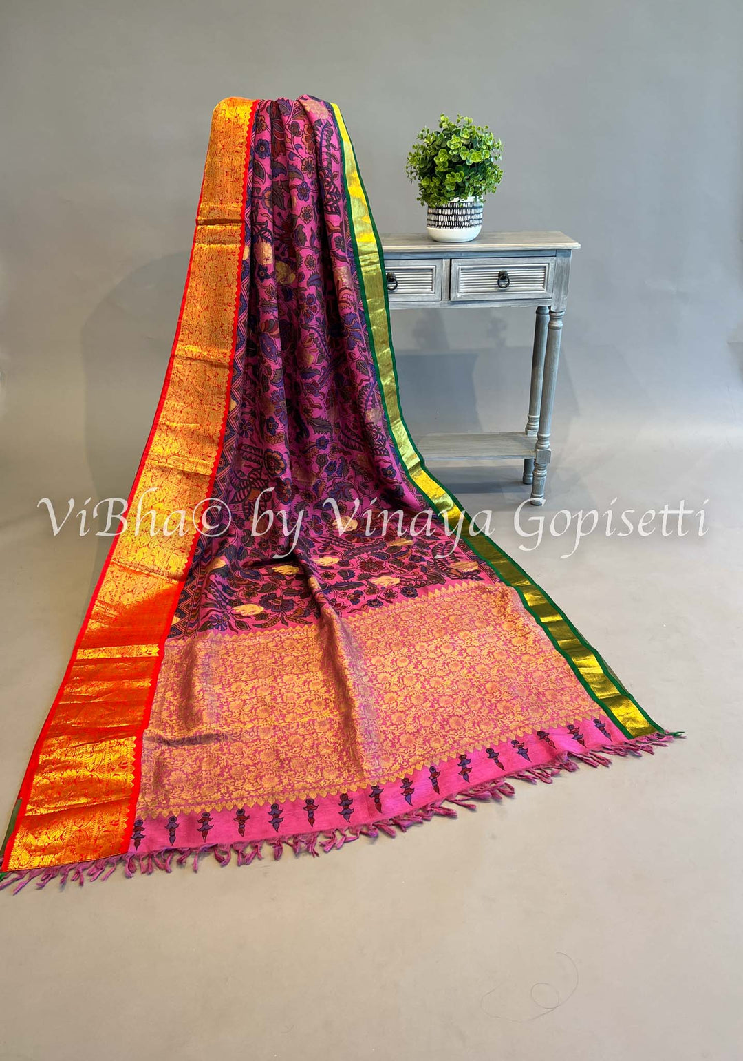 Pink Pen Kalamkari Silk Saree with Green and Red Ganga Jamuna borders and Blouse.