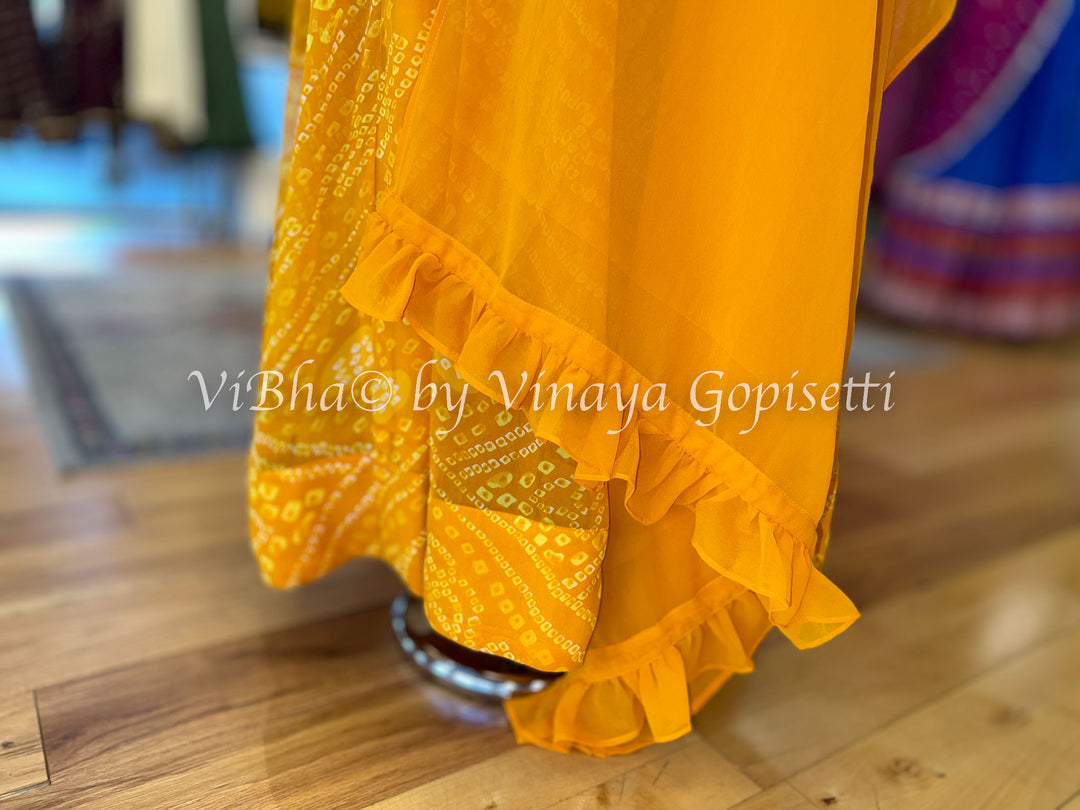 Orangish Yellow Bandhej Gown