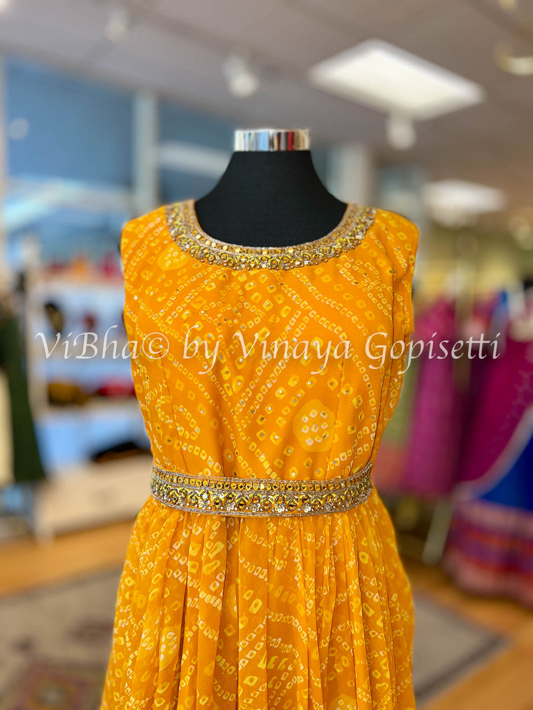 Orangish Yellow Bandhej Gown