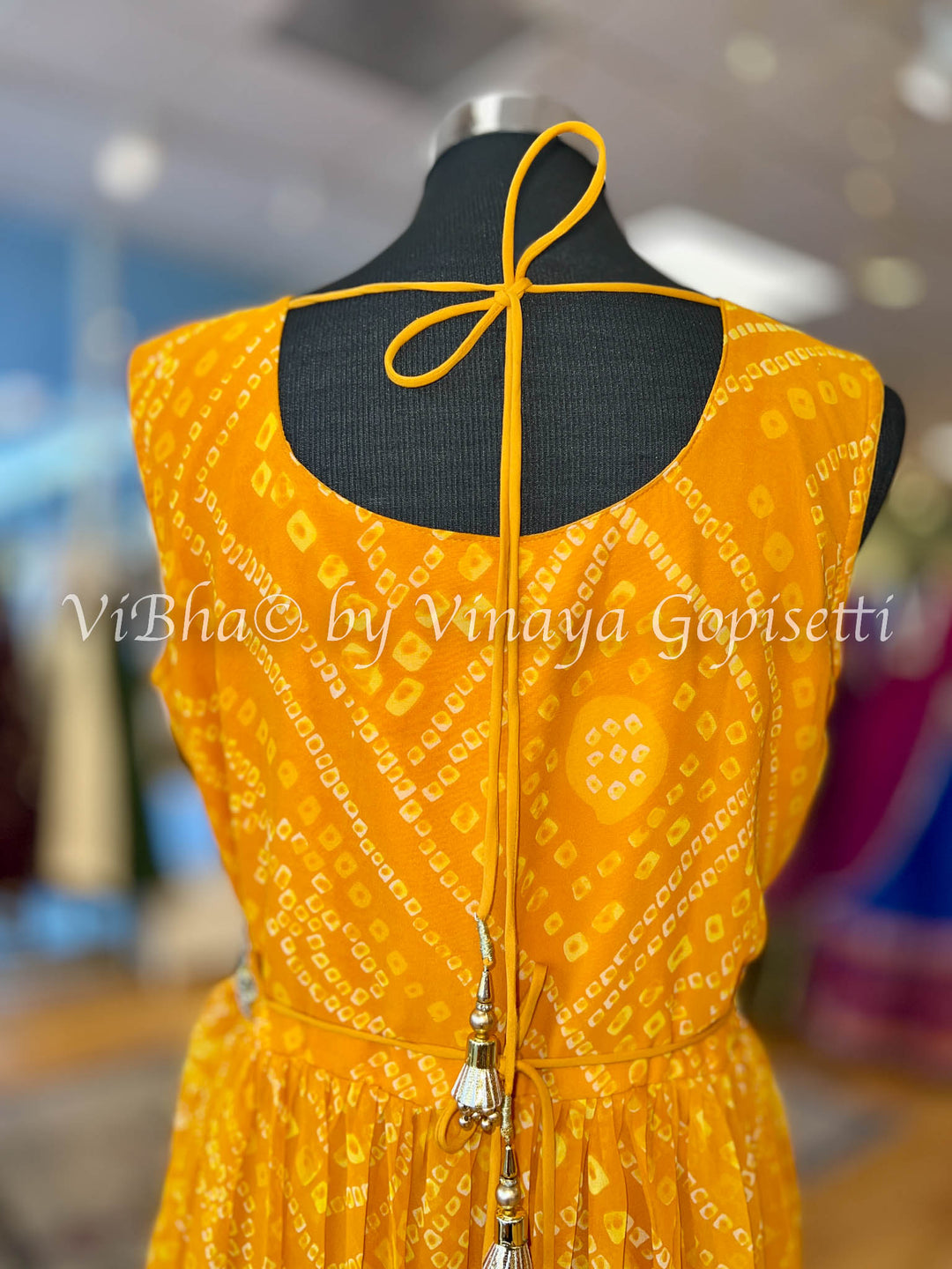 Orangish Yellow Bandhej Gown