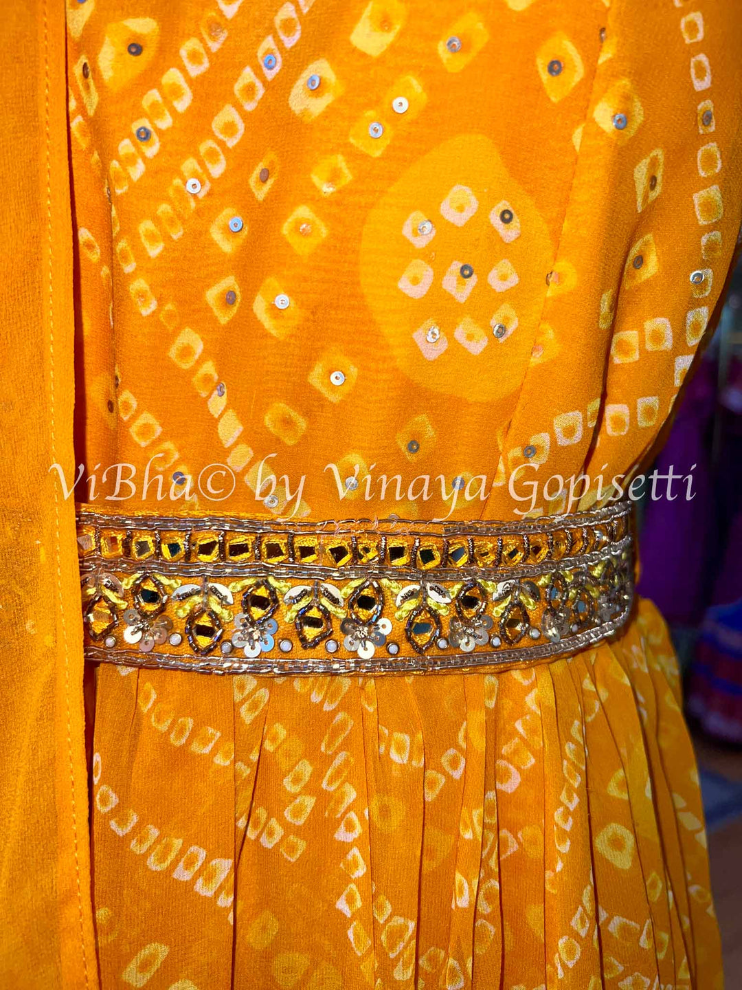 Orangish Yellow Bandhej Gown