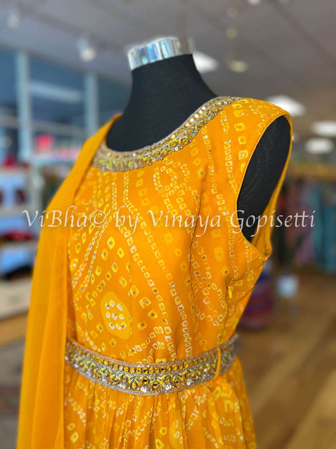 Orangish Yellow Bandhej Gown