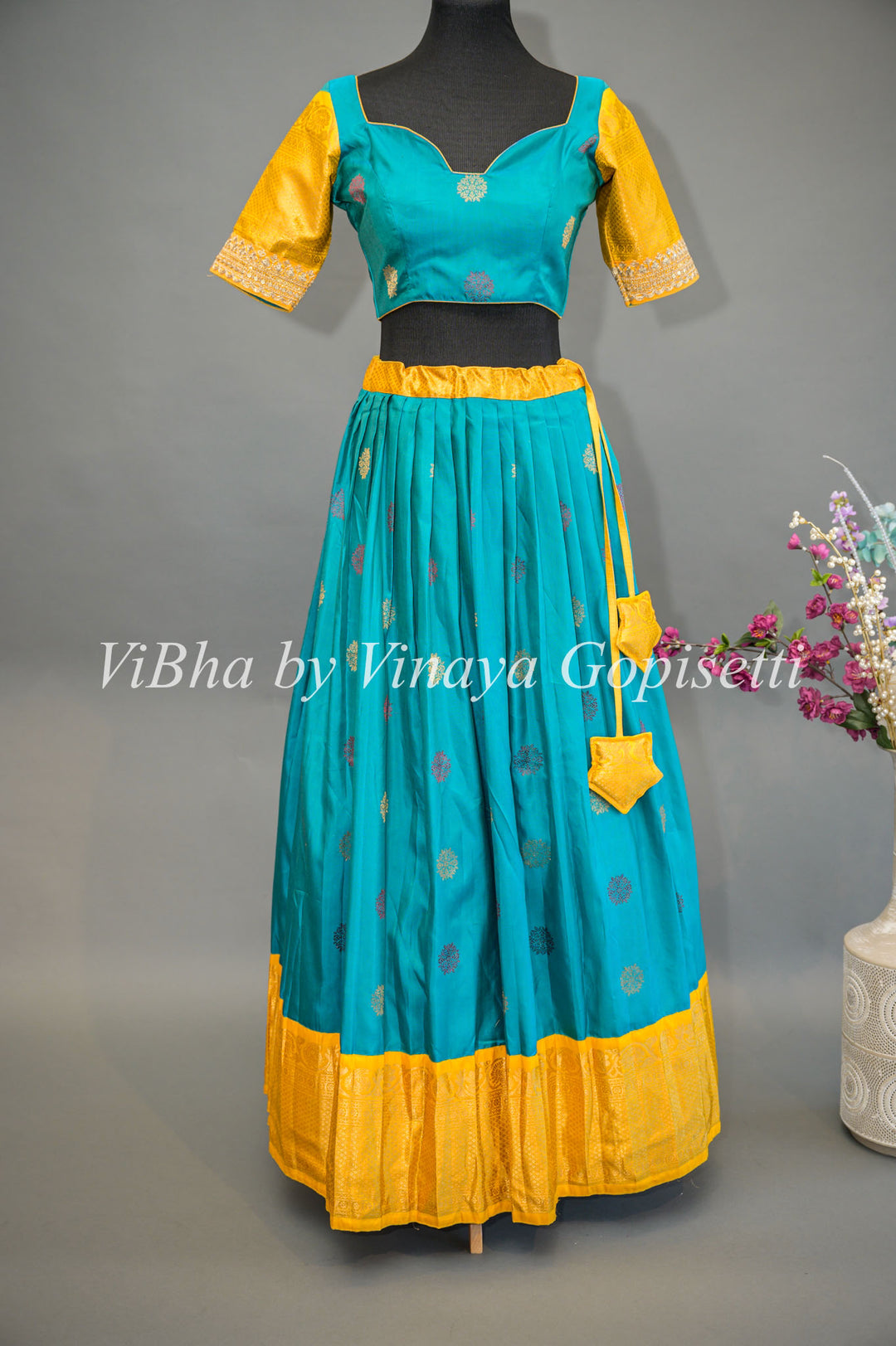 Teal Blue and Yellow Gadwal Silk Lehenga With Embroidered Borders And Yellow Embroidered Dupatta