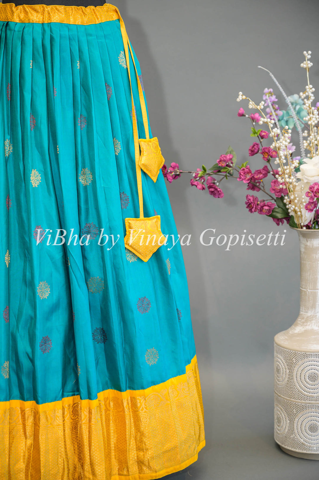 Teal Blue and Yellow Gadwal Silk Lehenga With Embroidered Borders And Yellow Embroidered Dupatta