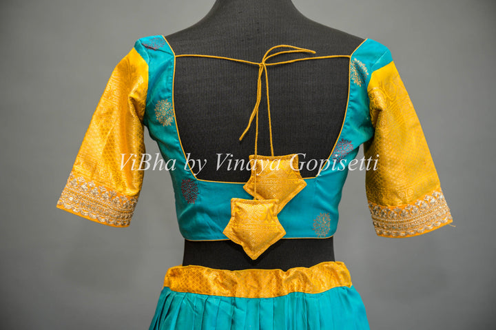 Teal Blue and Yellow Gadwal Silk Lehenga With Embroidered Borders And Yellow Embroidered Dupatta