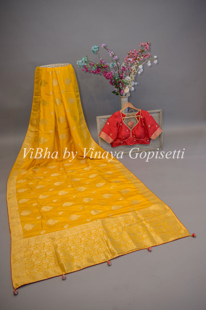 Yellow and Red Banarasi Silk Saree And Blouse