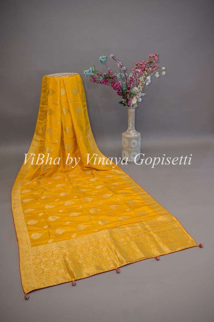 Yellow and Red Banarasi Silk Saree And Blouse