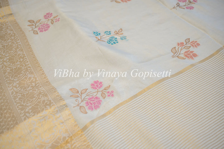 White Banarasi Silk Emnbroidered Saree And Blouse