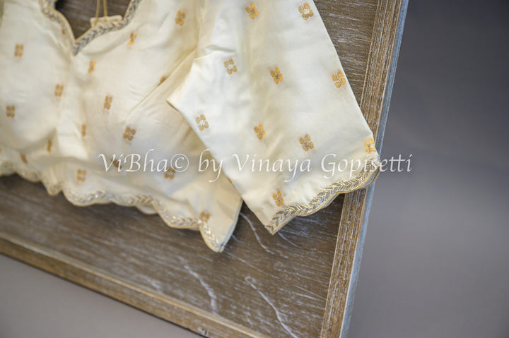 White Banarasi Silk Emnbroidered Saree And Blouse