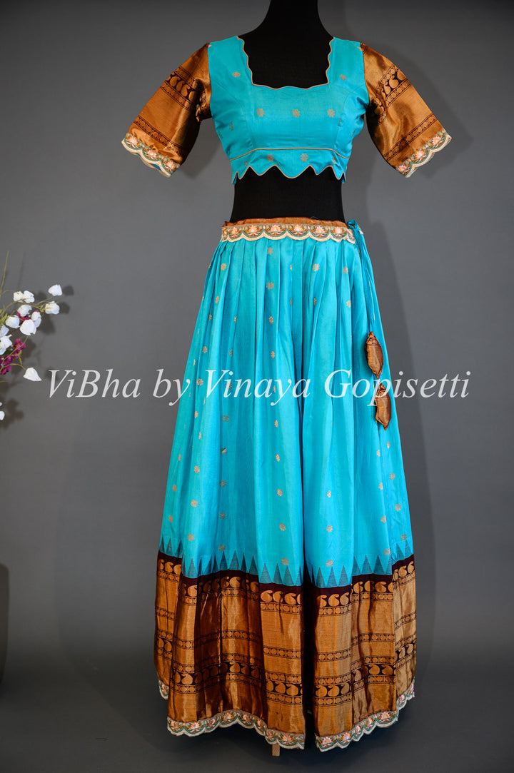 Dark Sky Blue and Brown Gadwal Silk Lehenga with Embroidered Borders And Peach Net Embroidered  Dupatta