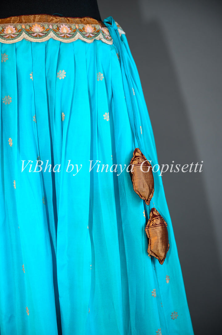 Dark Sky Blue and Brown Gadwal Silk Lehenga with Embroidered Borders And Peach Net Embroidered  Dupatta