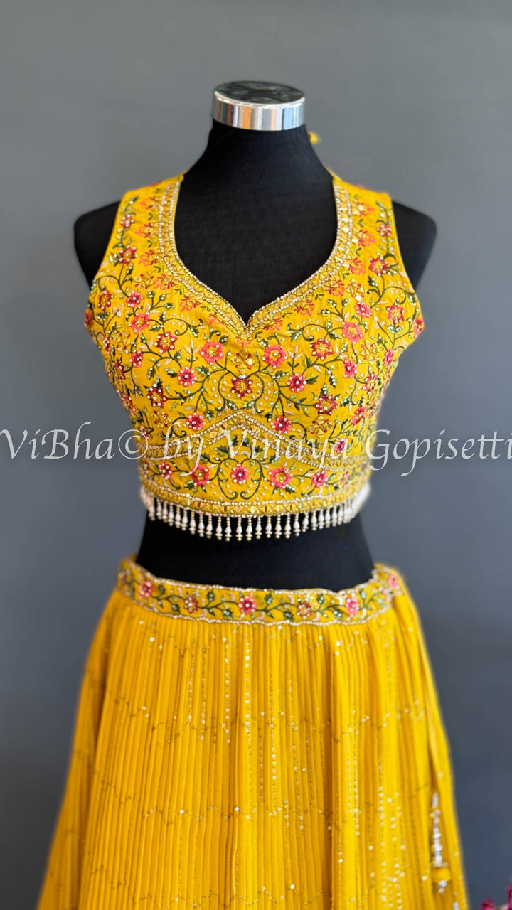 Yellow And Green Embroidered Lehenga Set