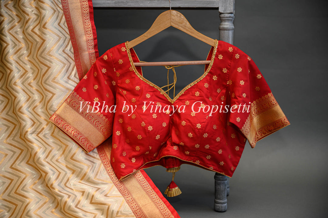 Butter Cream And Dark Red Banarasi Katan Silk Saree And Blouse With Patola Borders and Pallu.