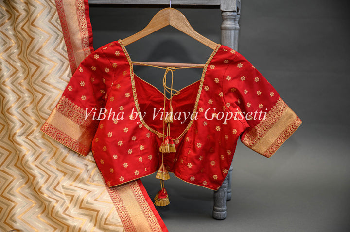 Butter Cream And Dark Red Banarasi Katan Silk Saree And Blouse With Patola Borders and Pallu.