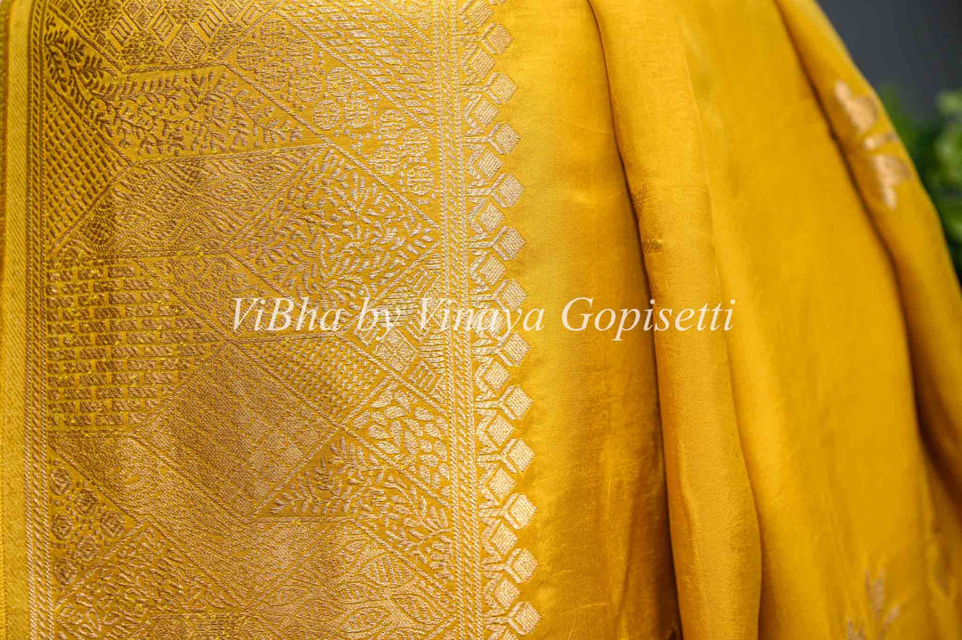 Yellow Banarasi Silk Saree With Flower Motifs And Blouse