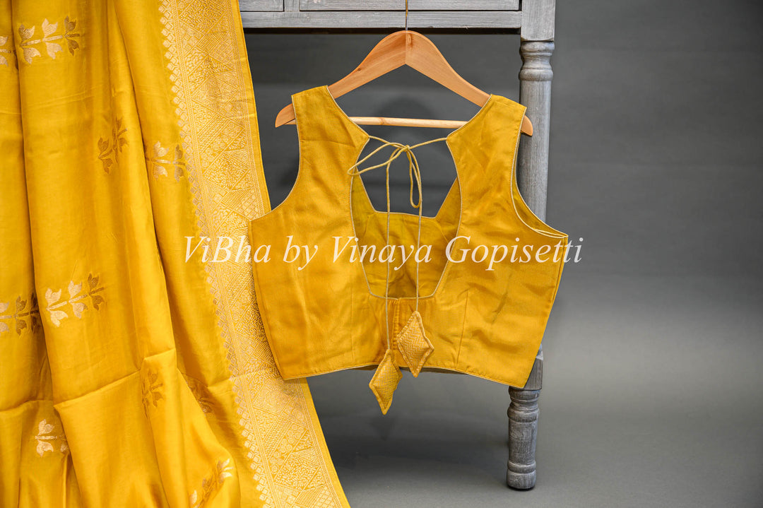 Yellow Banarasi Silk Saree With Flower Motifs And Blouse