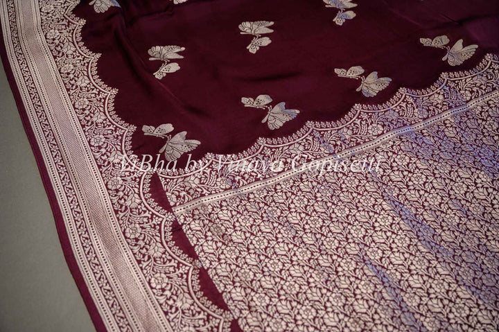 Dark Wine Banarasi Silk Saree And Blouse With Silver Zari Motifs and Borders