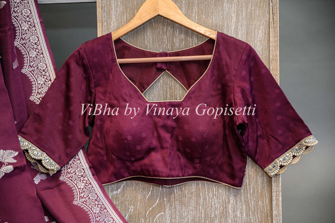 Dark Wine Banarasi Silk Saree And Blouse With Silver Zari Motifs and Borders