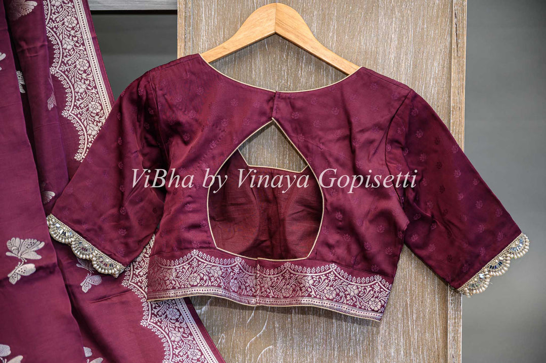 Dark Wine Banarasi Silk Saree And Blouse With Silver Zari Motifs and Borders