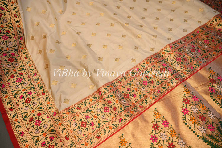 Butter Cream And Dark Red Banarasi Katan Silk Saree And Blouse With Paithani Borders and Pallu.