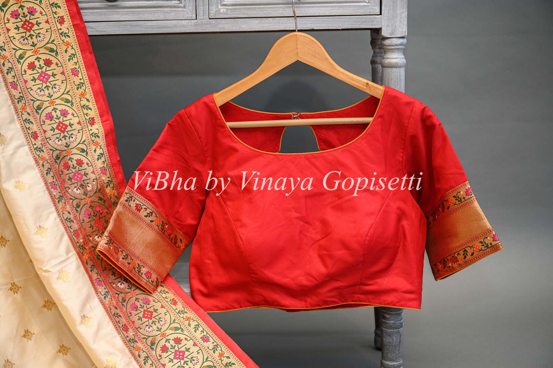 Butter Cream And Dark Red Banarasi Katan Silk Saree And Blouse With Paithani Borders and Pallu.