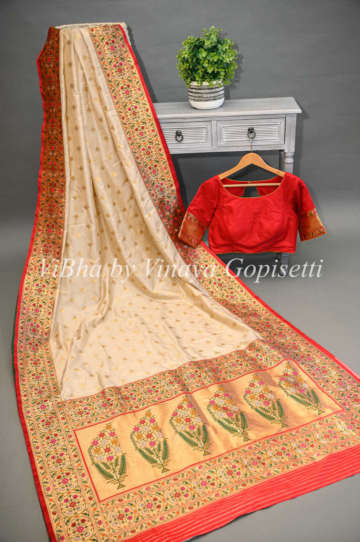 Butter Cream And Dark Red Banarasi Katan Silk Saree And Blouse With Paithani Borders and Pallu.