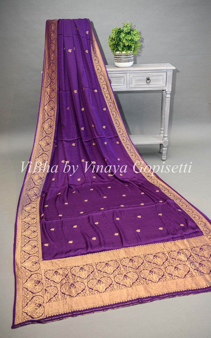 Purple Banarasi Silk Saree And Blouse With Gold Zari Motifs And Borders.