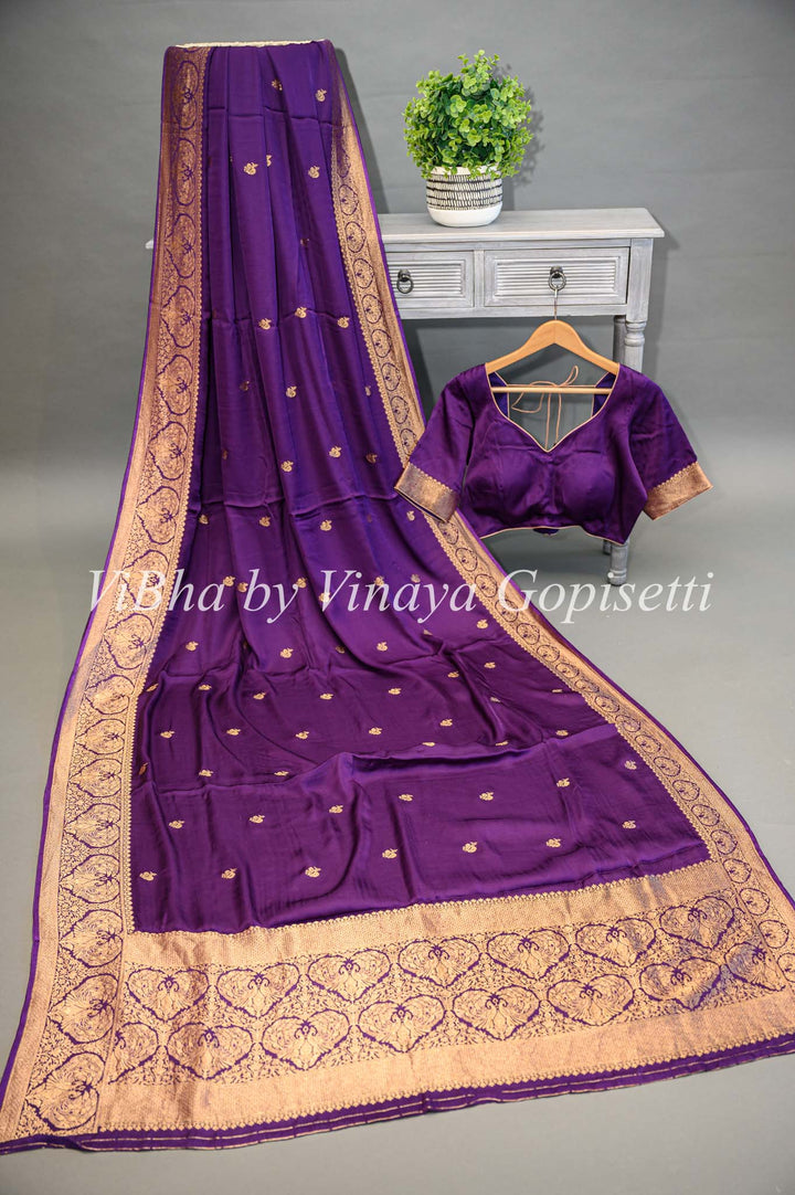 Purple Banarasi Silk Saree And Blouse With Gold Zari Motifs And Borders.