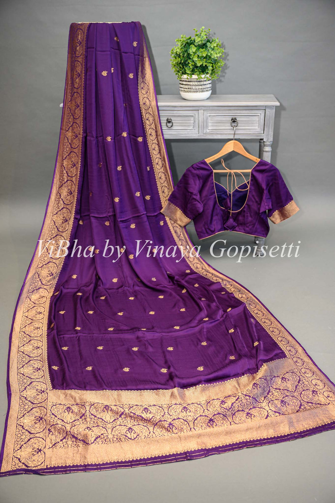 Purple Banarasi Silk Saree And Blouse With Gold Zari Motifs And Borders.