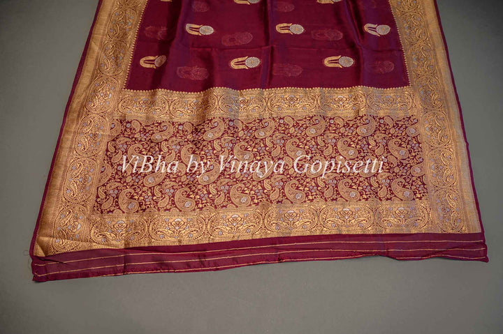 Burgundy Banarasi Kora Silk Saree With Gold And Silver Motifs and Borders