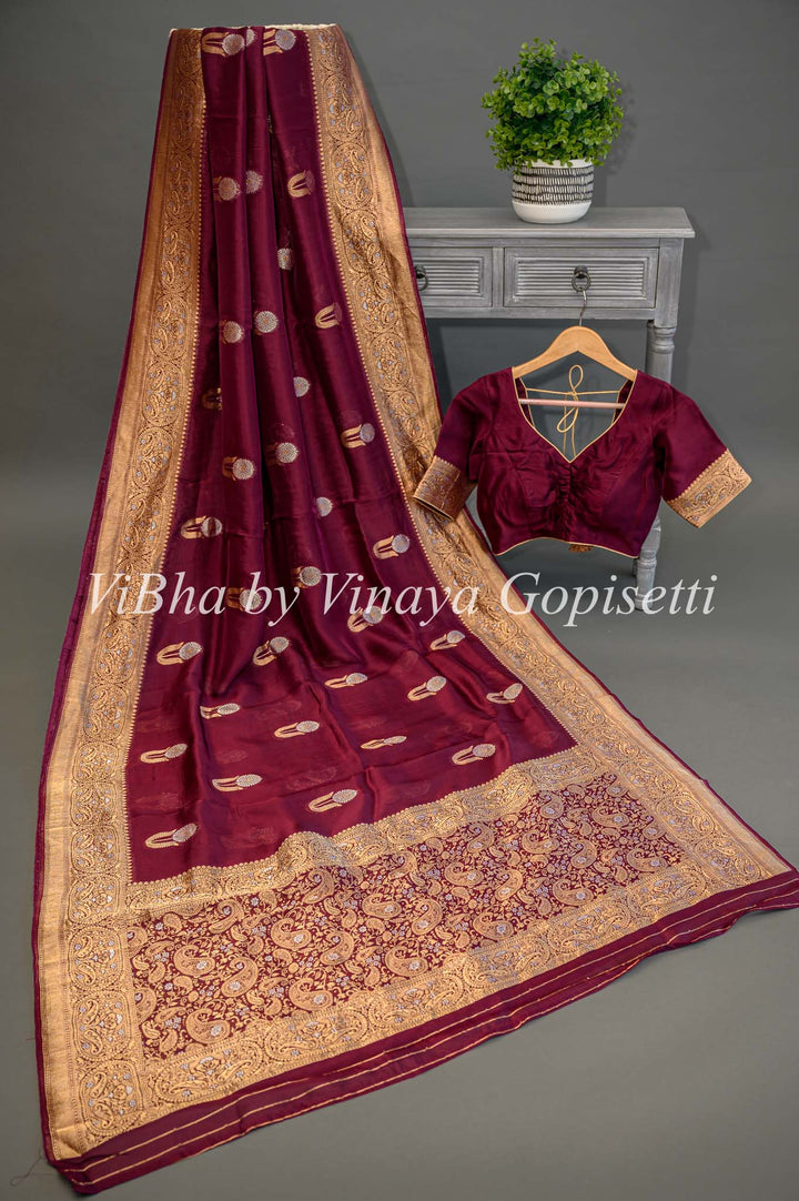 Burgundy Banarasi Kora Silk Saree With Gold And Silver Motifs and Borders