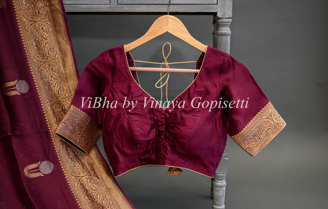 Burgundy Banarasi Kora Silk Saree With Gold And Silver Motifs and Borders