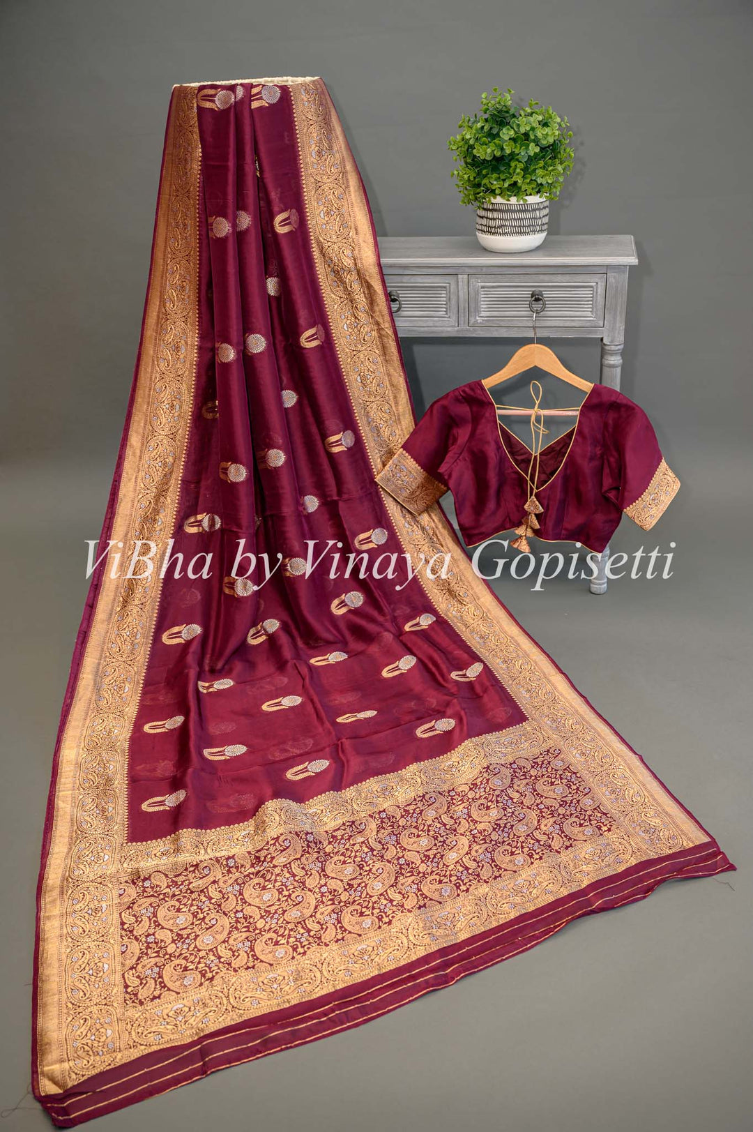 Burgundy Banarasi Kora Silk Saree With Gold And Silver Motifs and Borders