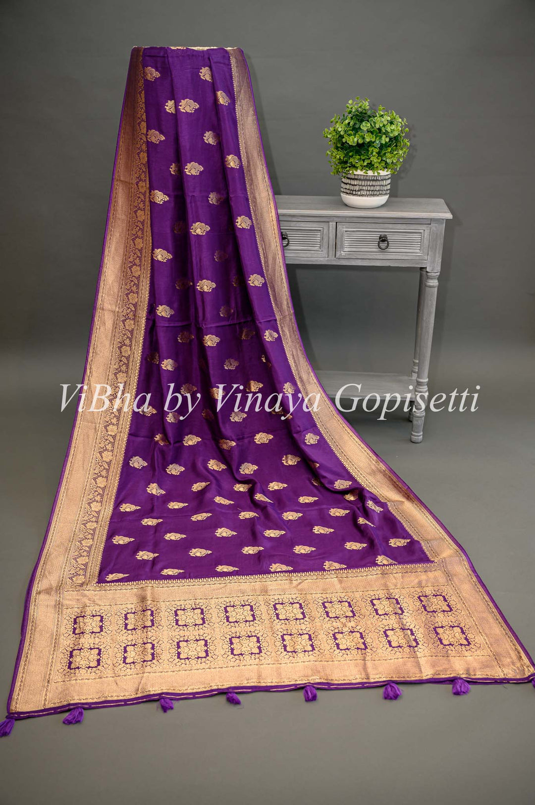 Purple Banarasi Silk Saree And Blouse With Gold Zari Motifs And Borders.