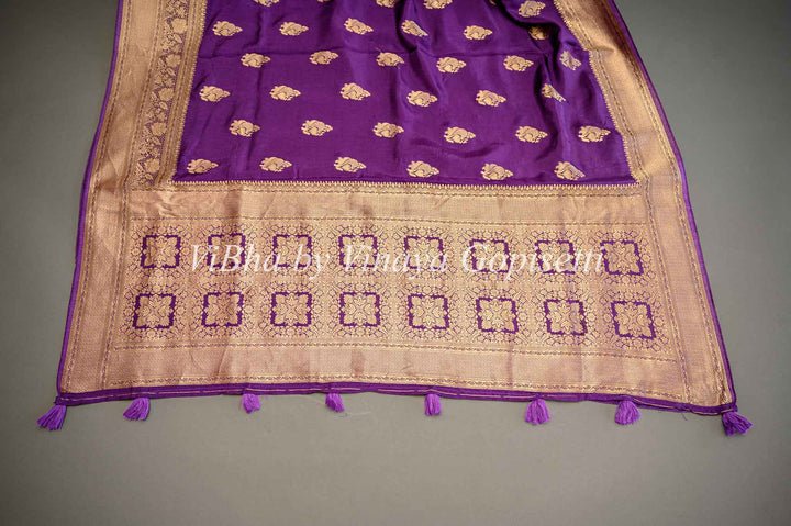 Purple Banarasi Silk Saree And Blouse With Gold Zari Motifs And Borders.