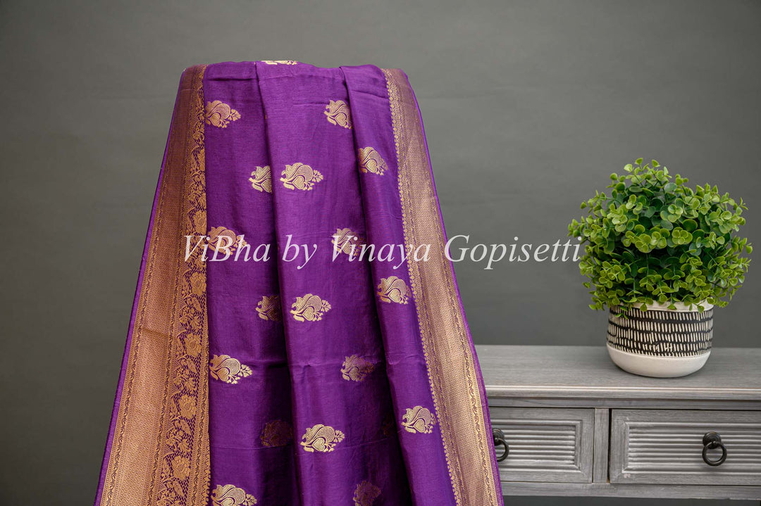 Purple Banarasi Silk Saree And Blouse With Gold Zari Motifs And Borders.